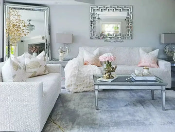 living room with mirror and sofas