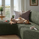 L-Shaped Sofa Slipcover (Left Chaise), Comfort Collection – Moss Green, interior view with dog | Moss Green